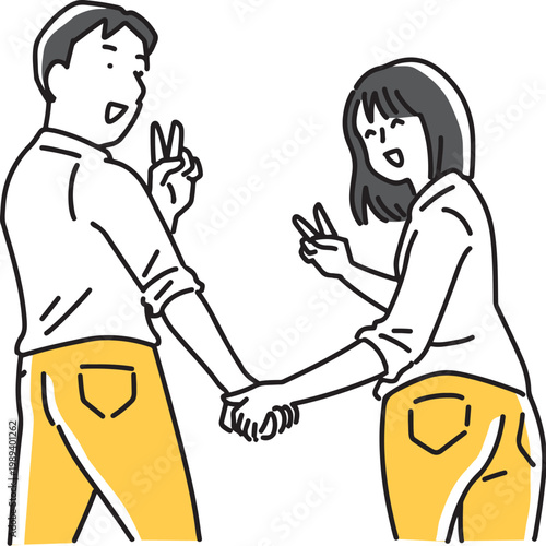 振り向いてピースするカップル