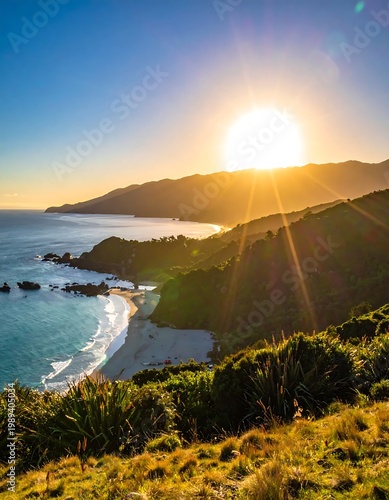 Coastal Mountains And Beach Scenic Landscape With Golden Green And Blue Colors As Sun Rays Shine During A Vibrant Sunset