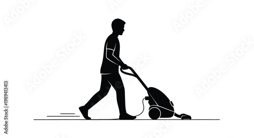 A silhouette of a man pushing a vacuum cleaner on a floor