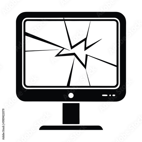 A broken computer monitor with a cracked screen