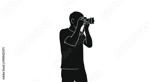 Silhouette of a photographer taking a picture with a dslr camera