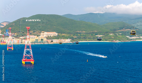 Tableau sur toile Aerial view of the cable car system over the sea at Vinpearl Cable Car, connecting the mainland to Hon Tre Island in Nha Trang, Vietnam