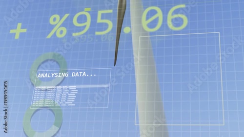 HUD appearing over wind farm and camera tilting, zooming toward main turbine analyzing percentages