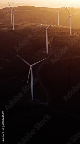 Clean energy being generated by wind power at dusk.