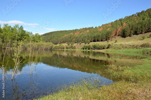 Landscape with the river and the mountains in the distance, Russia