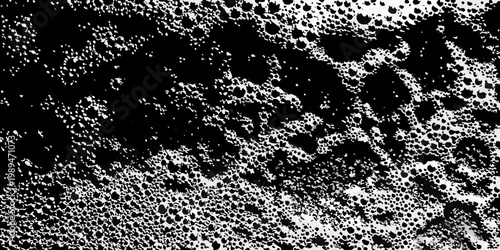 Abstract black and white texture resembling bubbles or foam patterns