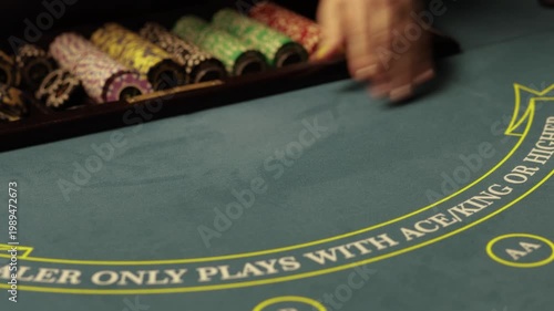 Croupier Dealing Cards on a Poker Table Close Up