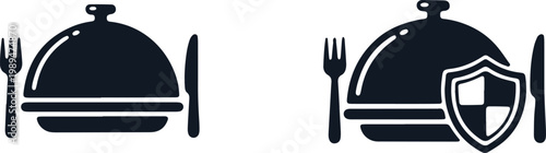 Food serving platter with cutlery and shield for safe food handling and protection.