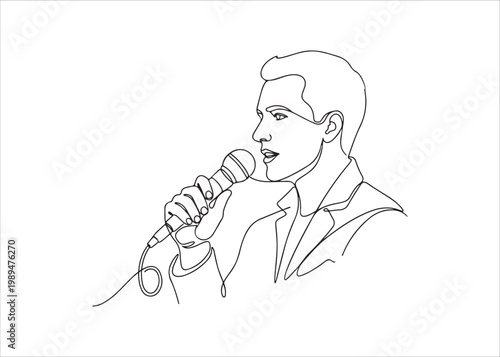 Man singing into a microphone in a suit and tie  music performance
