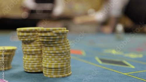 Casino chips on roulette table, close up