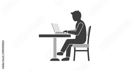 Man sitting at desk with laptop.