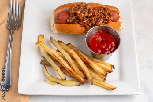 Canvas Print hot dog top with sloppy joe  with a side of french fries
