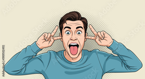 Playful young man making a funny face by sticking out his tongue and putting his fingers in his ears for humor.