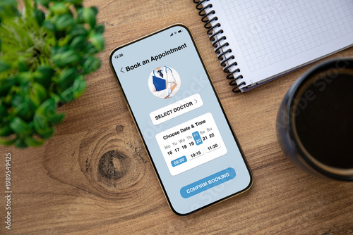 Phone with medical doctor appointment booking app interface in table