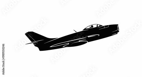 Black silhouette of a classic jet fighter in flight