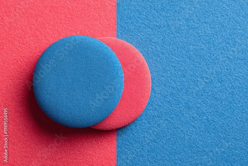 Colorful circular discs on vibrant textured backgrounds in contrasting colors