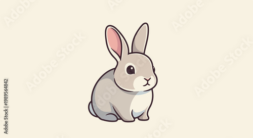 A cute, fluffy gray rabbit sits on a light beige background