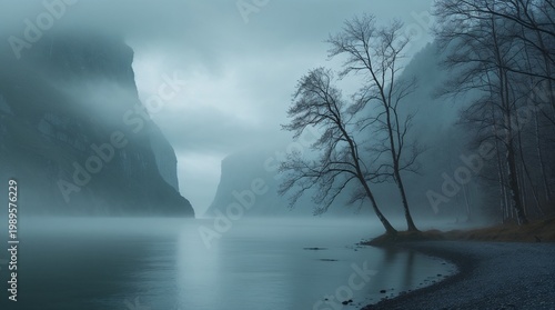 Misty landscape with trees by calm lake under cloudy sky  