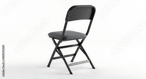 A black folding chair with a metal frame and gray seat and backrest stands alone on a white background.