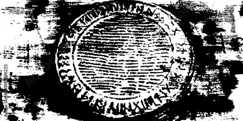 Round metal medallion with concentric ridges on surface