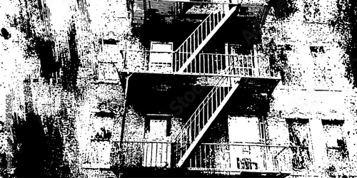 Apartment building fire escape on textured urban facade