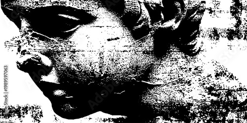 Ancient sculpture face exhibiting cracks and erosion on wall