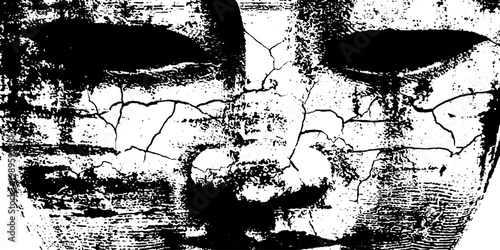 Cracked stone face displaying fissured surface in close view