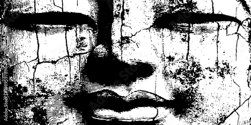 Sculpture face showing cracked weathered surface on wall