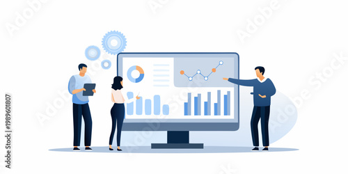 Team analyzing data and progress using a large computer monitor