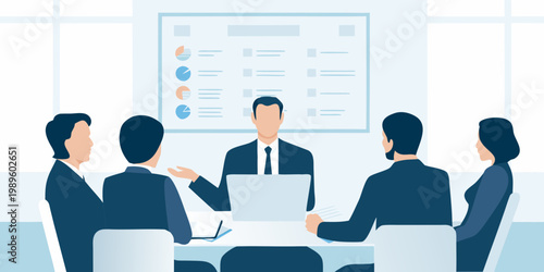 Business professionals attending a meeting and reviewing presentation data