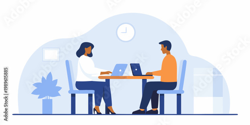 Two professionals collaborate and work on laptops in a modern office