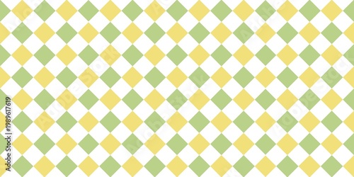 Seamless argyle pattern with pastel green and yellow diamond shapes. Classic chessboard background for spring themes, textiles, and minimal stationery design.