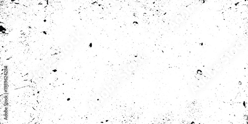 Minimalist grunge background with black ink splatters, scattered specks, dots, grain and subtle scratch marks on a clean white surface, abstract edgy style.