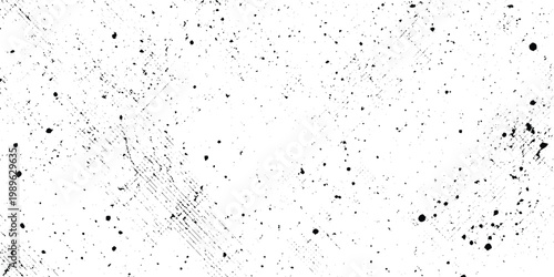 Minimalist grunge background with black ink splatters, scattered specks, dots, grain and subtle scratch marks on a clean white surface, abstract edgy style.