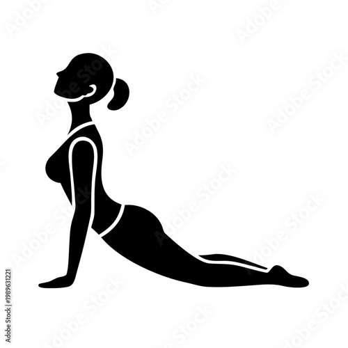Woman practicing cobra pose yoga