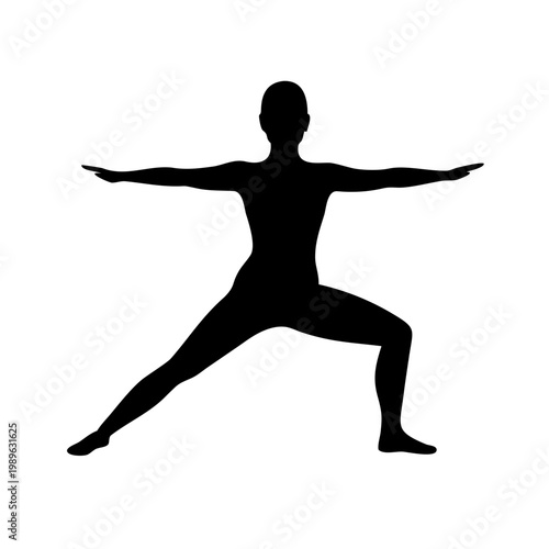 Silhouette of a woman practicing yoga in warrior ii pose