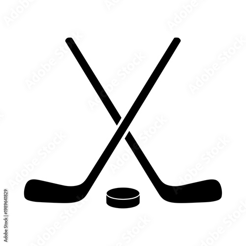 Photography Vector of crossed hockey sticks and a puck