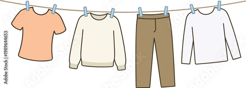 Assorted casual clothing including at-shirt sweater and pants hanging on a clothesline with blue