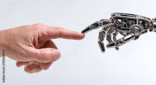 A human hand reaching out to a robotic hand, symbolizing the connection between man and machine.