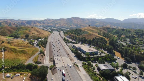 Aerial Cinematic View Flying Over US 101 Freeway Through Agoura Hills Southern California