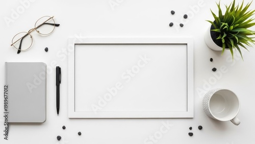 A well-organized workspace with a blank picture frame and office supplies