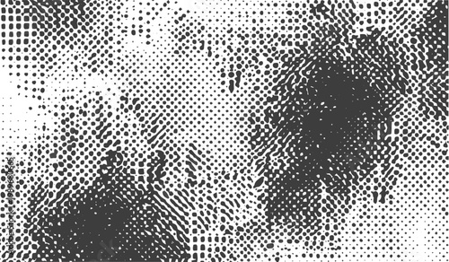 Abstract black and white halftone grunge texture with distressed dot patterns for vintage industrial background design