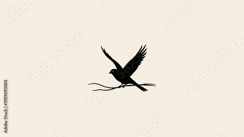 Silhouette of a bird taking flight from a branch against a light background