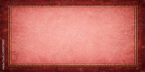 An aged red leather photo frame with a vintage grunge texture and a blank brown paper surface set against a rough material backdrop