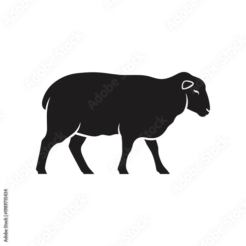 A black silhouette of a sheep walking in a field