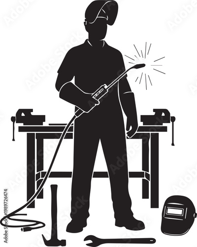 Silhouette of professional welder standing at workbench with welding torch in industrial workshop for manufacturing metal projects.