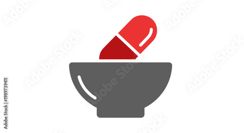 Mortar and red medicine capsule.