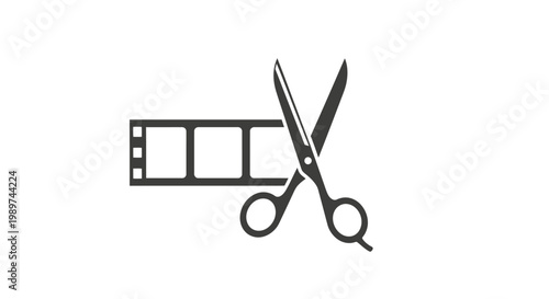 Scissors cutting film strip media edit.