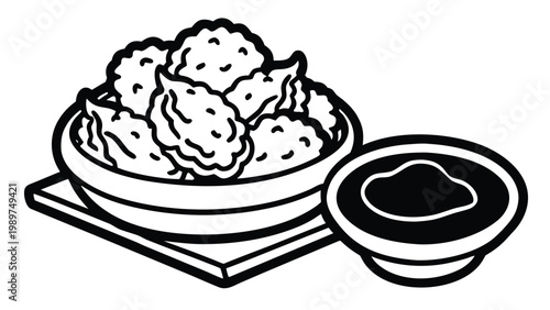 Steaming bowl of delicious fried chicken nuggets with savory dipping sauce side on coaster