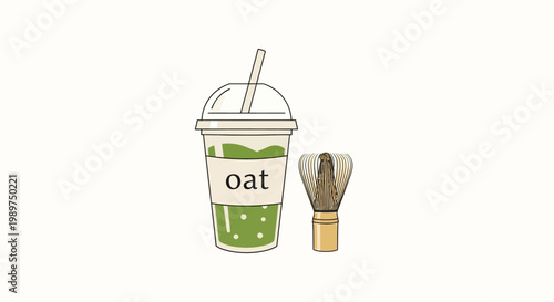 Oat milk drink with whisk.